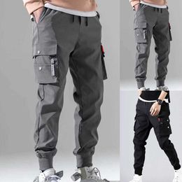 Men Pants multiple pockets elastic waist and drawstring Solid Color Thin Male Men Beam Feet Cargo Pants Men handsome pants 2021 Y0811