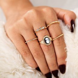 Five piece metal diamond ring set