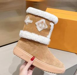 SNOWDROP FLAT ANKLE BOOT Women designer luxury wool snow boots A3