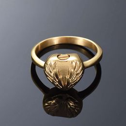 Wholesale stainless steel gold/silver heart-shaped wings ring casket to commemorate the deceased relative Keepsake