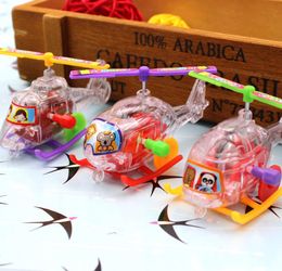 Clockwork transparent small plane Party Supplies plastic helicopter taxiing with propeller rotatable toy wholesale