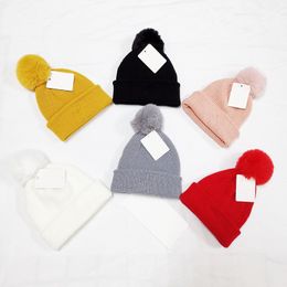 Luxury Pom Poms Beanie for Kid Designers Hats Autumn Winter Warm Solid Color Cap Children Outdoor High Quality
