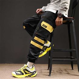 Hip Hop Black Pencil Pants Men Cargo Pants Streetwear Men Pockets Harem Joggers Spring Fashion Mens Pant Ribbon 211201