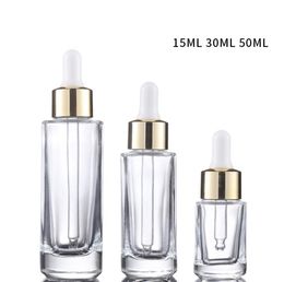 Empty clear 15ml 30ml 50ml facial eye serum bottles flat shoulder dropper glass bottle with gold silver lid SN4335