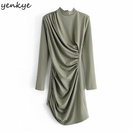 YENKYE Fashion Women Design Ruching Asymmetric Dress Vintage Solid Colour Long Sleeve High Neck Sexy Winter Dress Vestido 210515