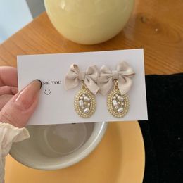 Stud Fashion S925 French Retro Fabric Bow Pearl Earrings Female Korean Temperament Cold Trend