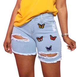 Shorts femininos Sexy Hollow Out Blue Ripped Jean Women Summer 2021 Moda High Caist Tassel Butterfly Woman Plus Tamanho Denim Short