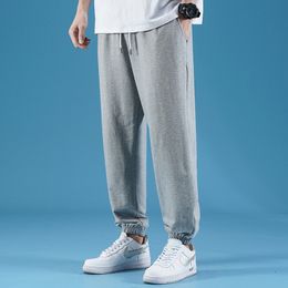 Spring men's casual sports pants , thin section, straight leggings for teenagers, drawstring wide-leg trousers