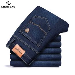 SHAN BAO autumn spring fitted straight stretch denim jeans classic style badge youth men's business casual jeans trousers 211104