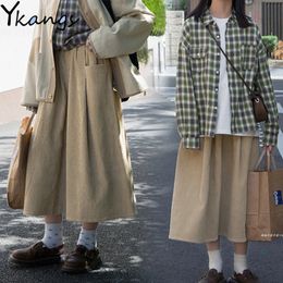 Winter Warm Corduroy Vintage Elastic High Waist Long Skirt Women pocket pleated skirt Korean Fashion Loose Midi Skirt Femme 210412