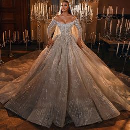 Luxury Champagne Wedding Dresses Crystal Pearls Bridal Gowns Glitter Dubai Long Sleeves Off Shoulder Robe de mariée Custom Made