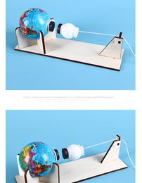 Wood student science and technology small-invention DIY globe universal gravity hand-assembled material packaging equipment