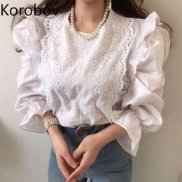 Korobov Vintage O Neck Lace Hollow Out Shirts Korean Chic Ruffles Solid Elegant Blusas Mujer Office Lady Flare Sleeve Blouses 210430