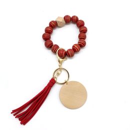 2022 new Cross-border personality bracelet craft carved wood beads keychain blank disc tassel key ring pendant multi-color optional factory