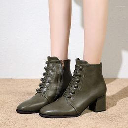 green cross ankle boots