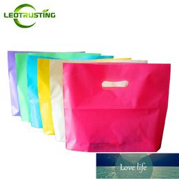 50pcs Wholesale Colour Beauty Plastic Shopping Bags with Handle Personal General Boutique Clothes Shoes Gift Packaging Pouches Factory price expert design Quality