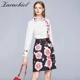 Women Autumn Elegant Floral Suits Runway Designer White Flower Print Shirt Tops and High Waist Short Skirt Two Piece Set 210416
