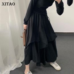 -Röcke Xitao 2021 Frühling Unregelmäßige hohe Taille gefaltete Rock Frauen dünne wilde elegante fishtail schwarze Mode Streetwear dmy2565