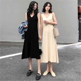 Fashion suspender A-line skirt mid-length autumn loose and thin v-neck ice silk knitted dress female 210520
