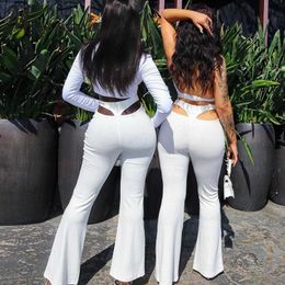 Missakso Hollow Out Flare Pants Y2K Summer Women Black White Sexy High Waist Stretchy Skinny Trousers Streetwear Party 210625