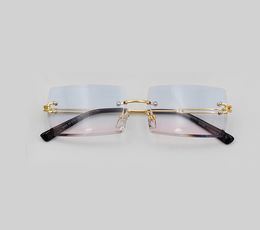 Gafas de sol de oro sin montura Gafas de gafas azul claro Lente de gradiente Moda Sol de moda para gafas unisex con caja