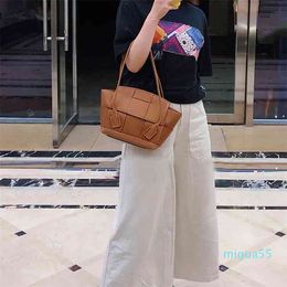 Autumn and winter woven wing leather portable one shoulder catfish fashion large capacity tot armpit bag