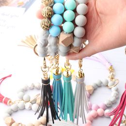 14 Colors Wooden Tassel Bead String Bracelet Keychain Party Food Grade Silicone Beads Bracelets Women Girl Key Ring Wrist Strap WLL872D5