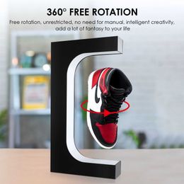 Levitazione magnetica LED Scarpa galleggiante Rotazione a 360 gradi Espositore Stand per sneaker Casa Negozio per la casa Espositore per scarpe Espositore 211026