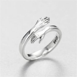2021 Metal Alloy Plated Silver Hand Rings Hugging Hands Open Ring for Women Girls Men Jewellery Silver Hug Hands Adjustable Silver Rings