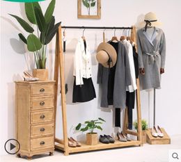 Minimalist men's and women's clothes Wardrobe Storage Commercial Furniture solid wood clothing store rack display racks floor type retro children's cloth hanging