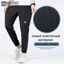 Duckwaver Men Solid Black Pencil Pants Quality Light Casual Male Trousers Fashion Comfortable Men Pants Large Size M-5XL 210723