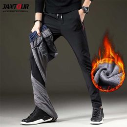 Men Winter Thick Warm Cargo Pants Casual Fleece Pockets Long Trousers Fashion Outdoor Slim Jogeer Worker Male Pants 28-38 211201