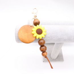 Foreign trade wooden bead silicone sun flower keychain can print round key ring