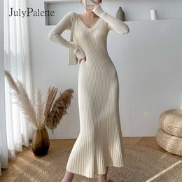 JulyPalette Solid Knitted Dress Fall Winter V-neck Slim Long Sleeve Dress Elegant Ladies Black Midi-length Sweater Dresses 211221