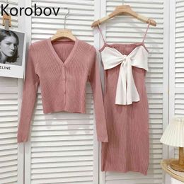 Korobov Korean Sweet Hit Colour Patchwork Bow Spaghetti Strap Dress and V Neck Long Sleeve Cardigans 2 Pieces Sets Elegant Suits 210430