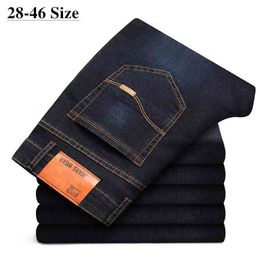 Classic men's plus size jeans Fashion business casual elastic force Slim fit black blue Brand trousers 40 42 44 210716