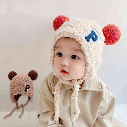 New 1-3 Year Old Baby Hat Winter Ear Protection Lace Coral Fleece Double Ball Warm Hat Riding Hat Baby Y21111