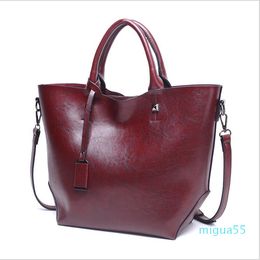 bucket large capacity oil leather women's bag fashion ladies one-shoulder handbag simple and versatile cosmetic bags