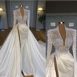 Bling Mermaid Wedding Dresses Deep V Neck Illusion Pearls Crystal High Side Split Arabic Satin Bridal Gowns Robe De Marie Plus Size Long Sleeves