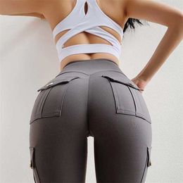 NORMOV Fitness Women Leggings Withe Pocket Solid High Waist Push Up Polyester Workout Leggings Cargo Pants Casual Hip Pop Pants 211216