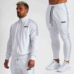 Jogger spring and autumn new double zipper sports and leisure strip splicing suit outdoor running leisure loose Athletic Wear G1222