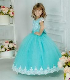 Well-Designed Ball Gowns For Special Occasion Puffy Tulle Flower Girl Dress with Lace Appliques Bow Beading Short Sleeves