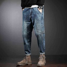 2021 Famous Fashion Designer Loose Jeans Men Straight Dark Blue Colour Printed Mens Jeans Ripped Denim Pants G0104