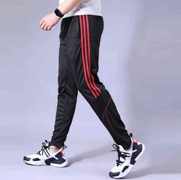 Pantaloni sportivi uomini che corrono zip tascabile atletico calcio calcio pantalone allenamento sciolto di ghisa sportiva pantaloni da ginnastica G0104