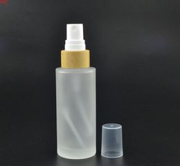 50pcs 100ml glass toner lotion spray bottle with bamboo lid Empty Clear frosted cosmetic packaging SN1033goods