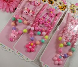 Set di gioielli regalo per bambini Girl perle perle con pendenti cartone animato Collana anello bracciale per capelli set di peli set di boccette di Natale a favore della festa Premio Pink