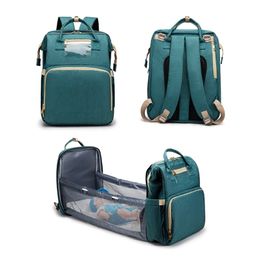 2 IN 1 Portable Mummy Bag Folding Cot Bed Crib Multifunctional Large-capacity Waterproof Baby Diaper Bag Traveling Backpack 211025