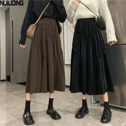 Women Irregular Pleated Suede Leather Skirts Autumn Winter Solid High Waist Vinatge Faux A-Line Skirt Mujer Faldas 210514