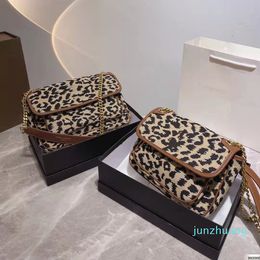 Designer- Leopard pattern canvas bag Womens Messenger bags with classic Metal letter Retro fashion style Brown Purse 2 size handbag