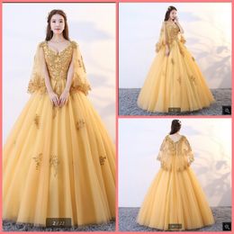 modest sweet 16 dresses UK - Robe de soiree Gold tulle vintage ball gown prom dress modest v neck with cape lace appliques party dresses beaded sweet 16 princess puffy long quinceanera gowns